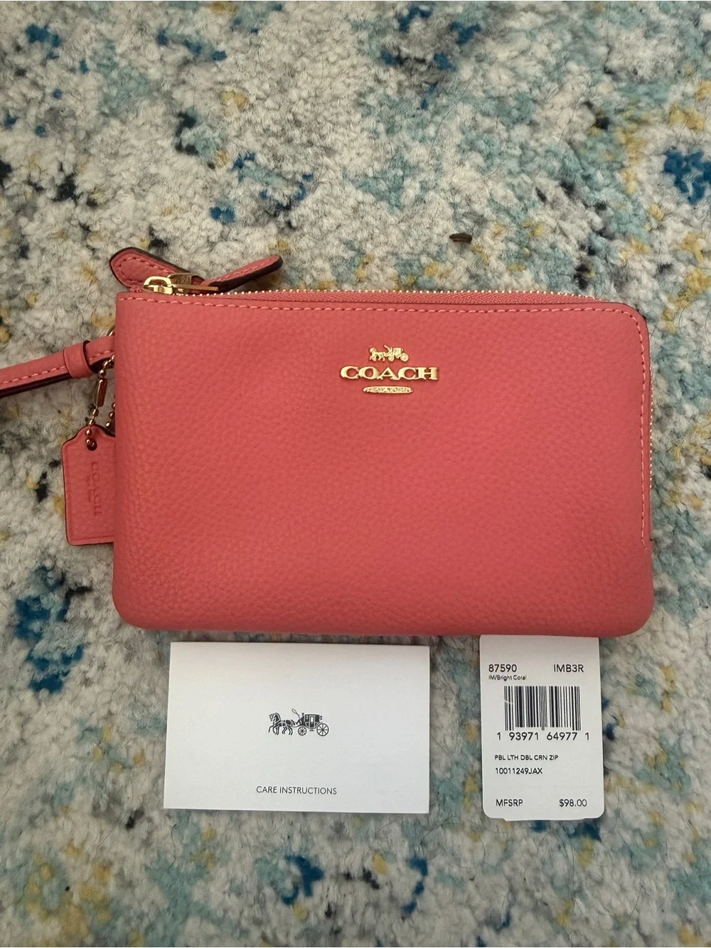 COACH Pebbled Leather Wristlet in Rose Pink with Gold Logo